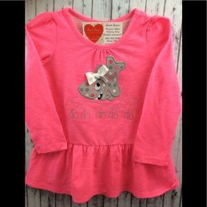 Girls long sleeve ruffled baby shark shirt.